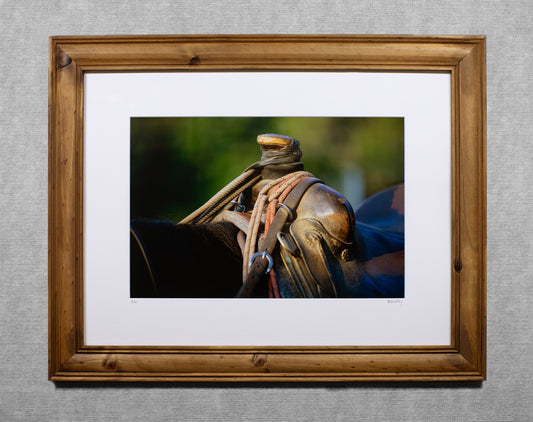 A Cowboy's Saddle - 12x18 matted Lustre print in an 18x24 Rustic wood frame.